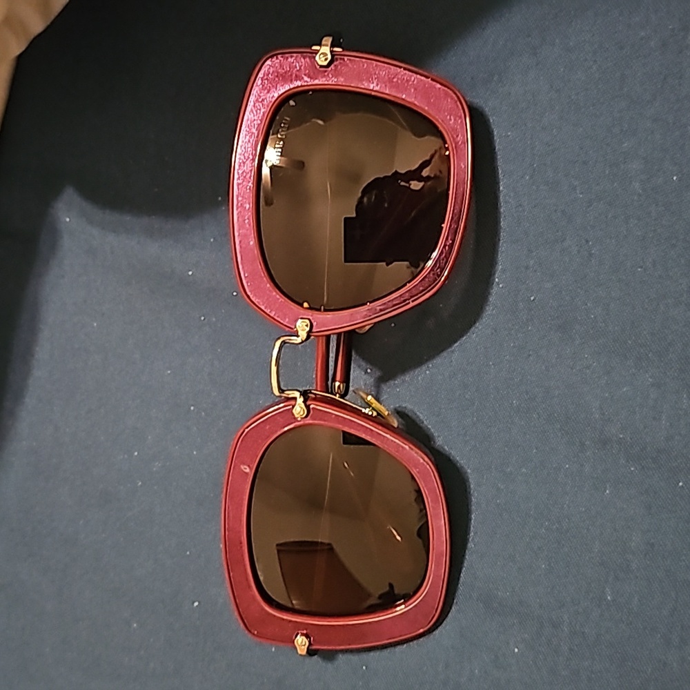 - Burgundy sunglasses Mui Mui